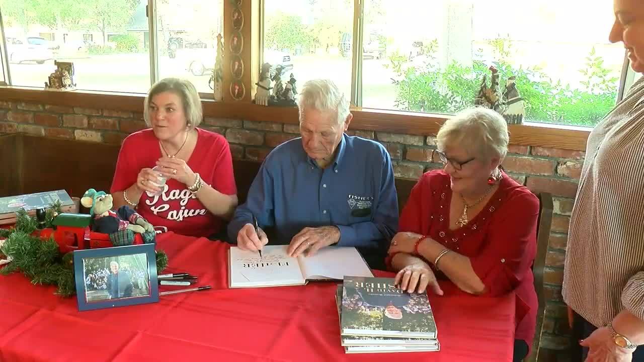 Local WWII vet celebrates 94th birthday, holds book signing for autobiography